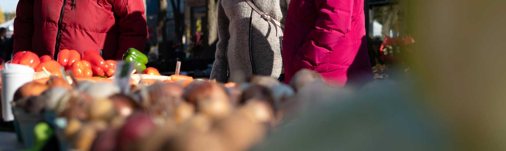 active senior living, independent living, three seniors at farmers market