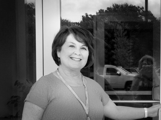 Hospice Volunteer Genny opening door