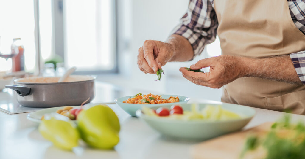 Fresh produce ingredients on a kitchen countertop during meal preperation.