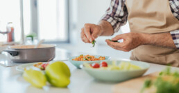 Fresh produce ingredients on a kitchen countertop during meal preperation.