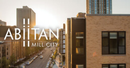 aerial shot of Abiitan Mill City at sunset with their logo overlaid on the photo