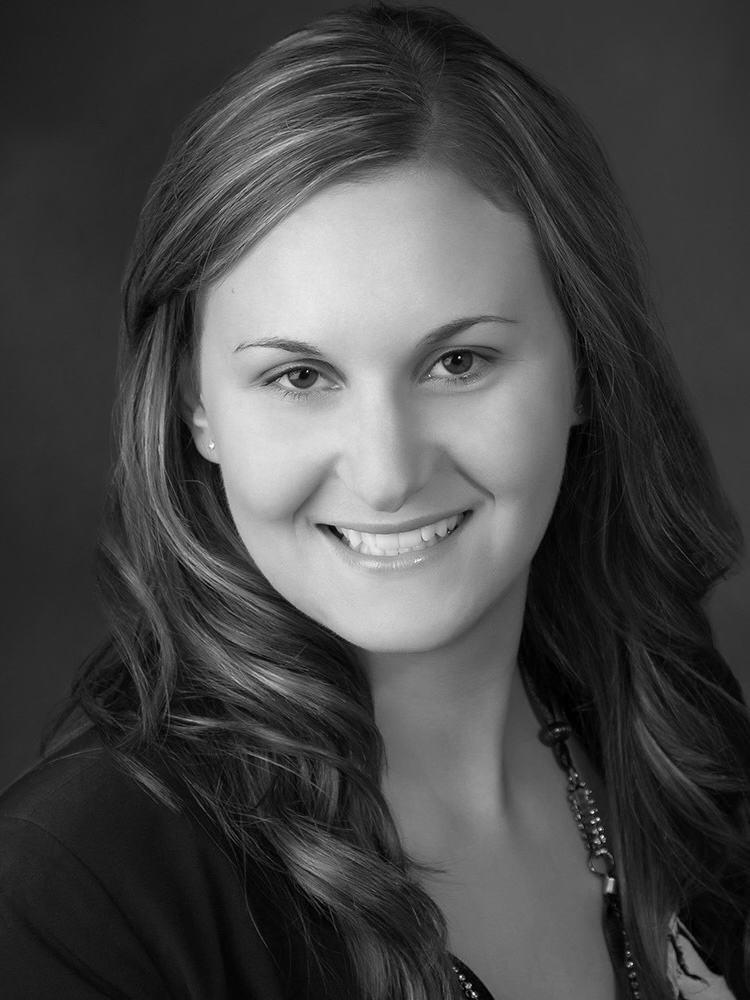 Black and white professional portrait of Danielle Olson