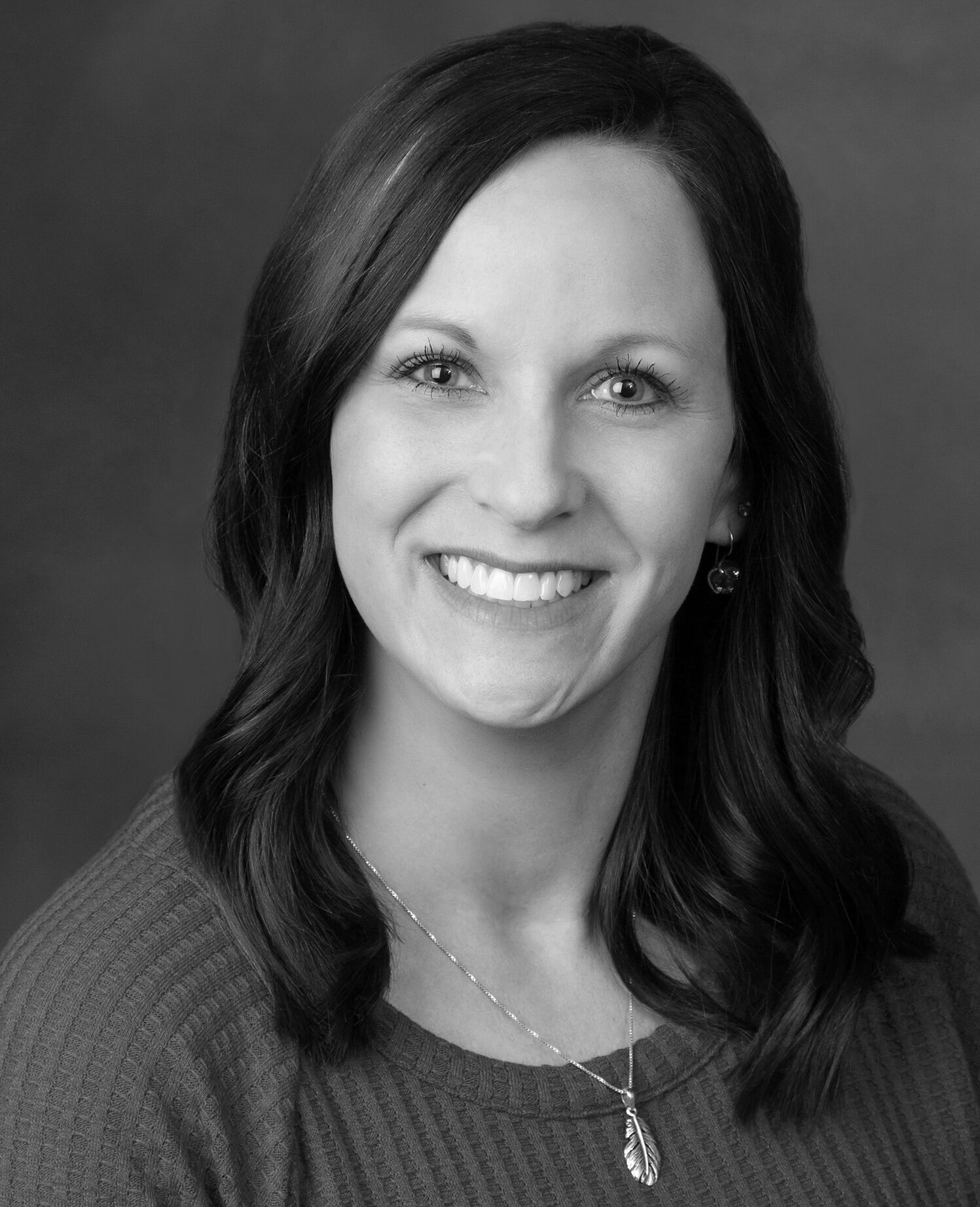 Black and white professsional portrait of Jennifer Beeson