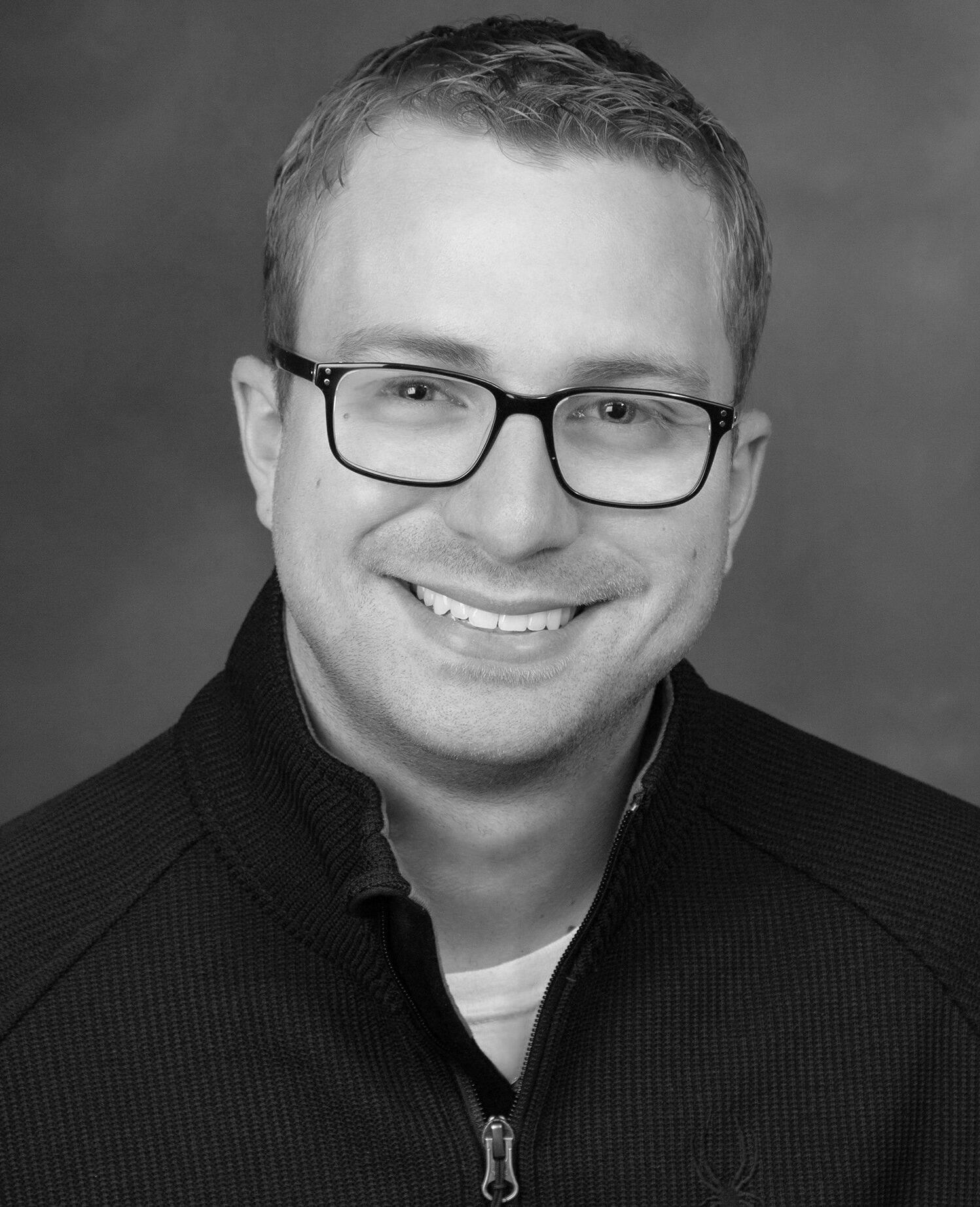 Black and white professional portrait of Charlie Newland