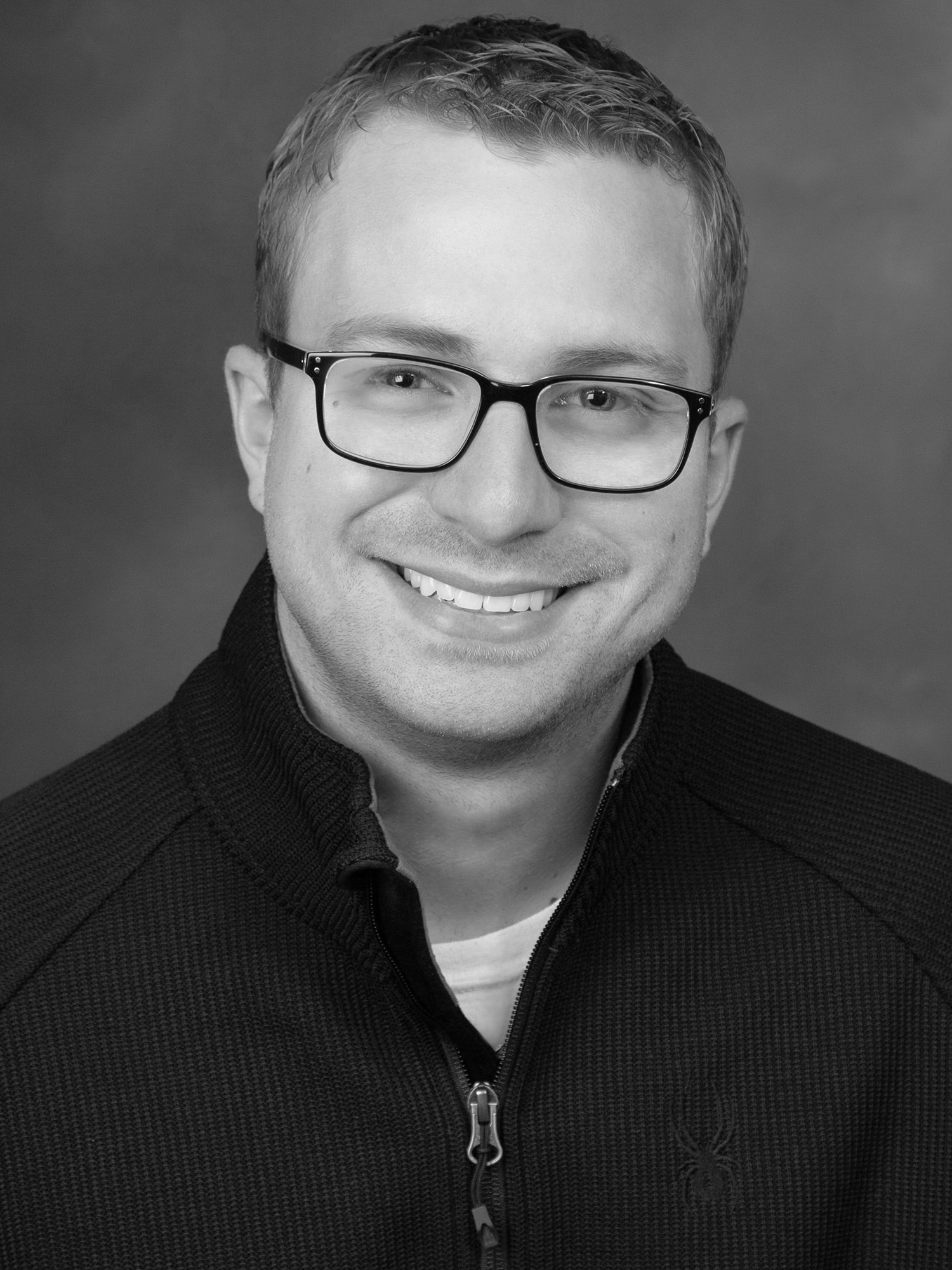 Black and white professional portrait of Charlie Newland