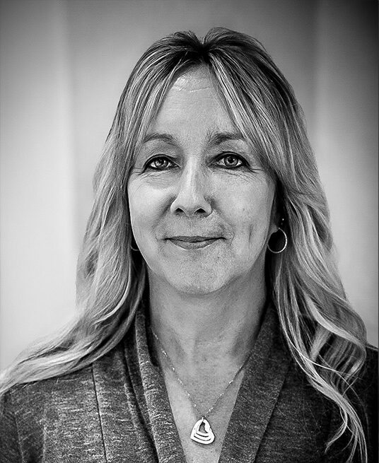 Professional black and white portrait of Layna Quast