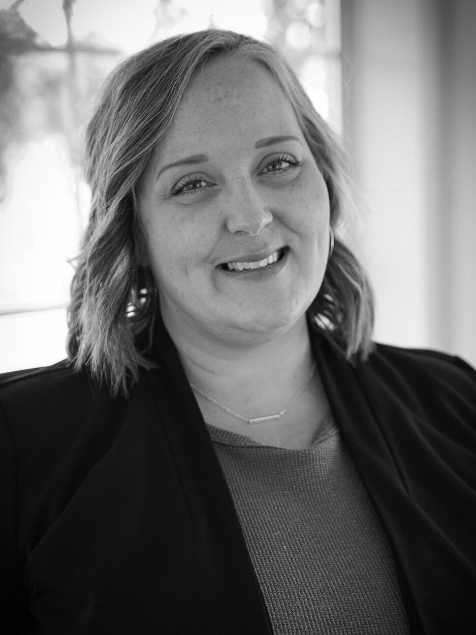 Black and white professional portrait of Emily Springer