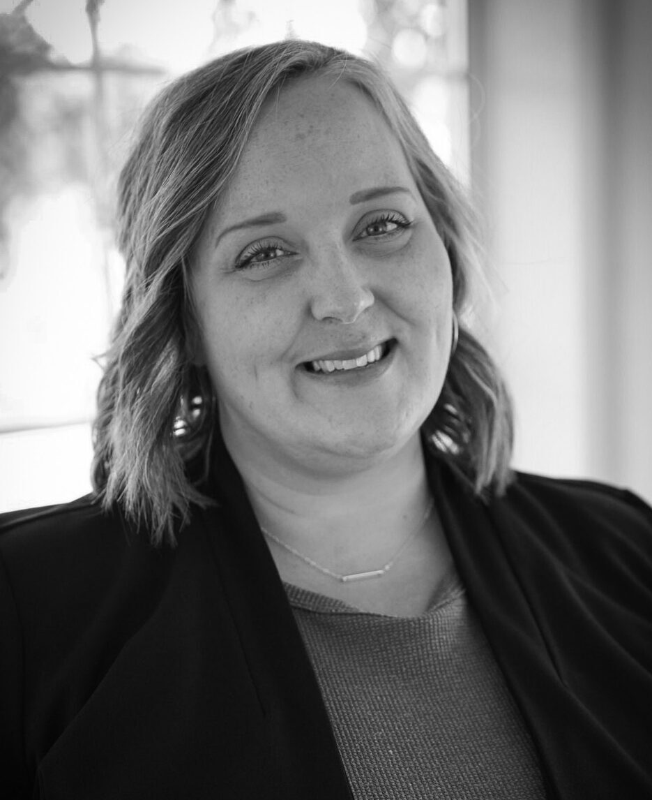 Black and white professional portrait of Emily Springer