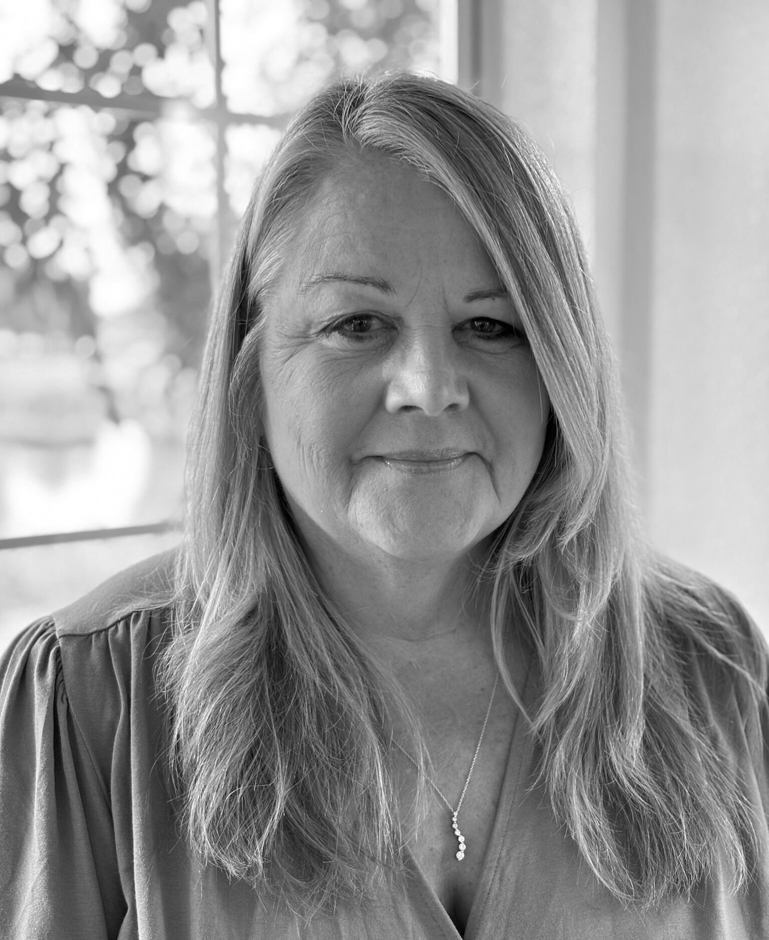 Black and white professional portrait of Nancy Solinger