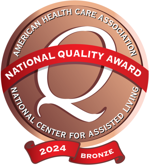 National Quality Award badge graphic in bronze for year 2024, issued by American Health Care Association & National Center for Assisted Living