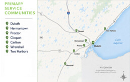 A map showing primary service communities in Minnesota near Lake Superior, marked with green pins for cities including Duluth, Hermantown, Proctor, Cloquet, Carlton, Wrenshall, and Two Harbors.