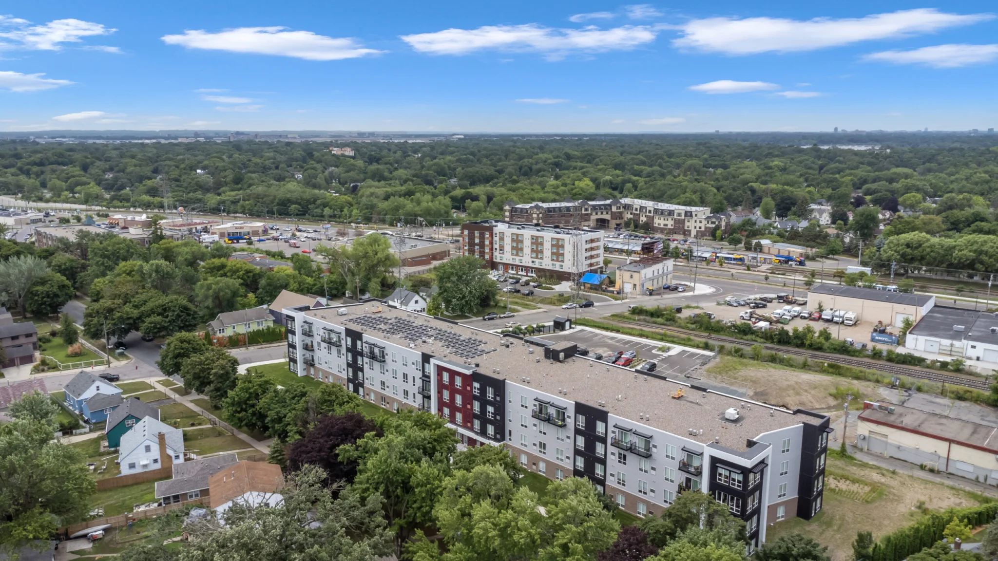 aerial shot of The Hillock with blue skies
